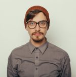 portrait-interesting-young-man-winter-clothes-scaled